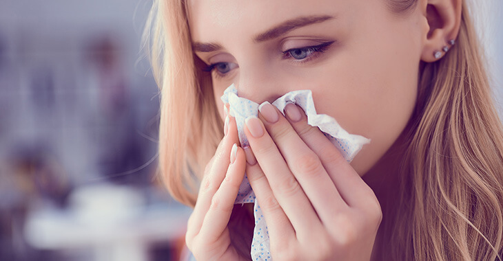 woman with runny nose