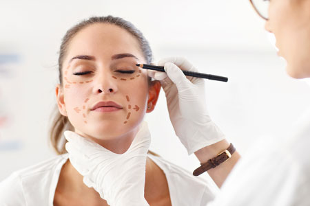 woman preparing before plastic facial surgery