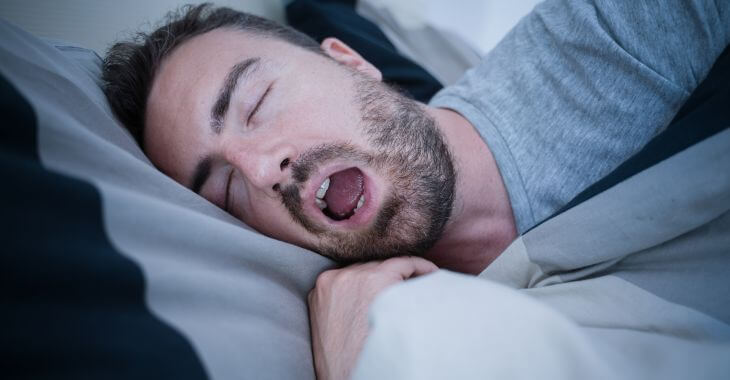 Man sleeping with his mouth open.