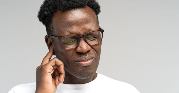 An Afro-American man suffering from tinnitus.