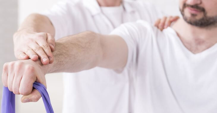 A man during physical therapy session