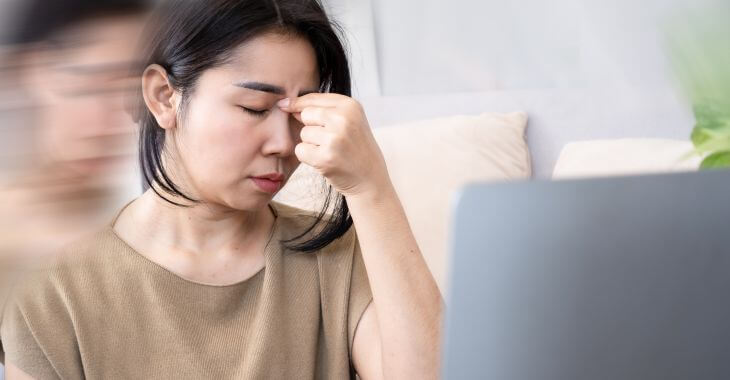 Asian middle-aged woman feeling dizzy 